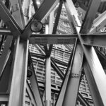 Grayscale photography of scafoldings